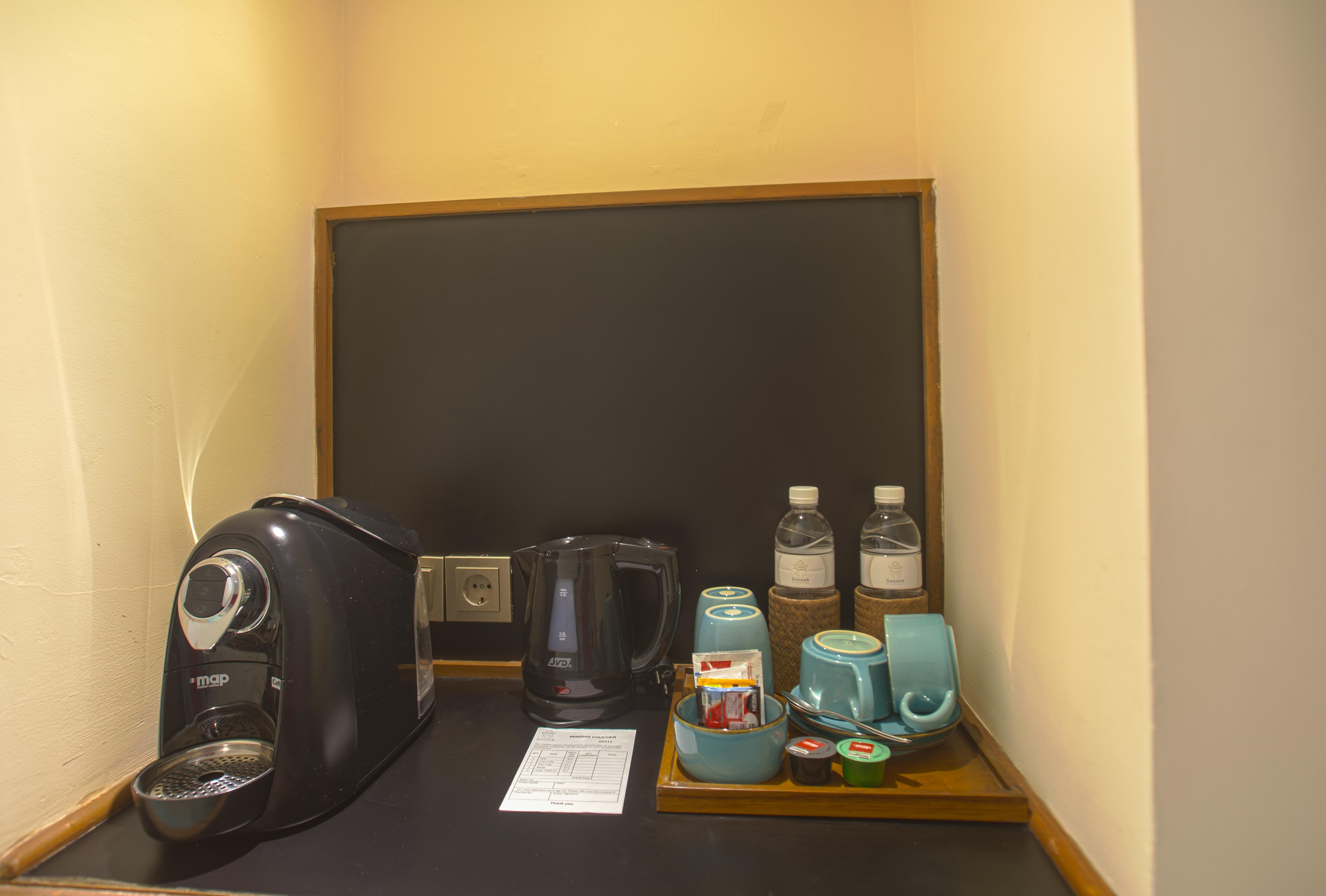 Sadara Resort Nusa Dua (Bali) Exterior foto A Nespresso coffee machine in a hotel room